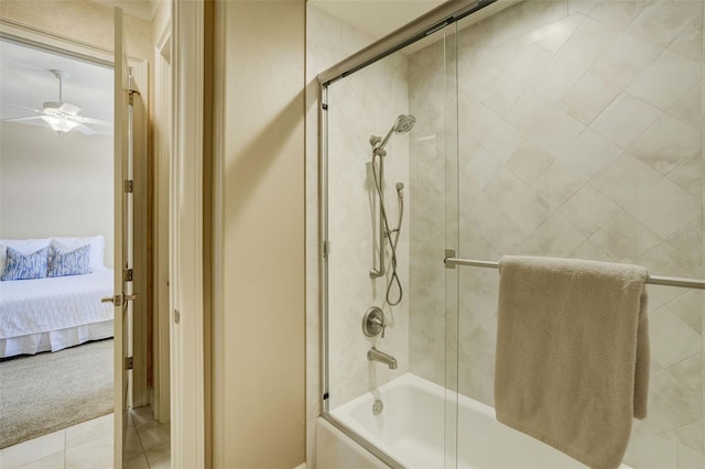 bathroom with combined bath / shower with glass door, tile patterned floors, connected bathroom, and ceiling fan