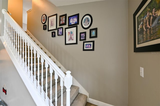 staircase with baseboards