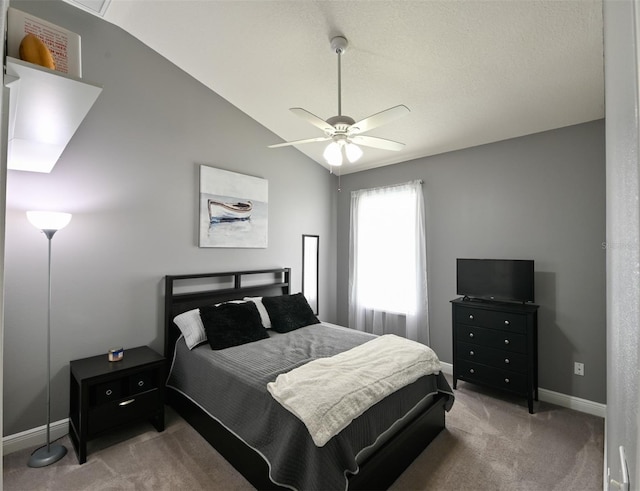 bedroom featuring a ceiling fan, baseboards, carpet, and lofted ceiling