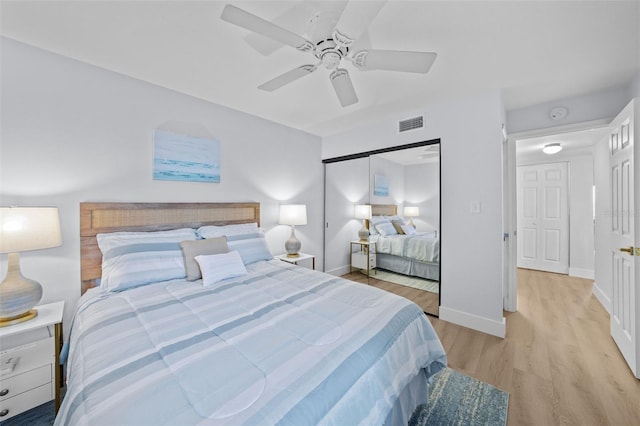 6051 Sun Blvd Unit 111, Saint Petersburg, FL 33715 - bedroom featuring a ceiling fan, baseboards, light wood-style floors, and visible vents