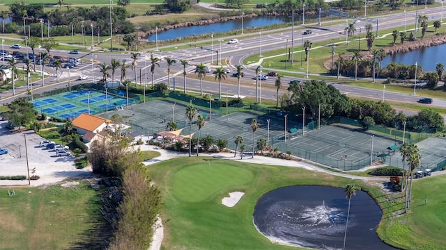 6051 Sun Blvd Unit 111, Saint Petersburg, FL 33715 - drone / aerial view featuring a water view
