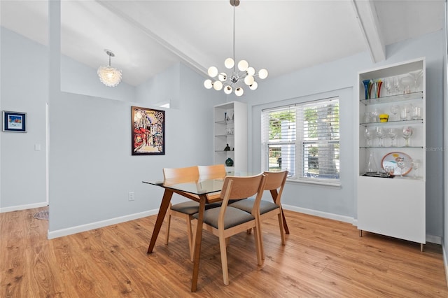 11368 93rd St, Largo, FL 33773 - dining area with a chandelier and light wood finished floors
