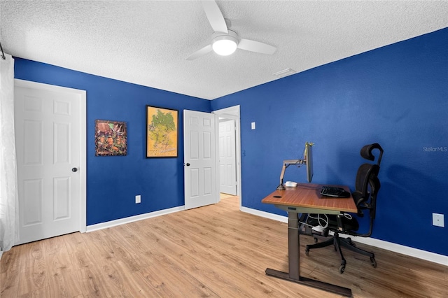 11368 93rd St, Largo, FL 33773 - office featuring a textured ceiling, a ceiling fan, and wood finished floors