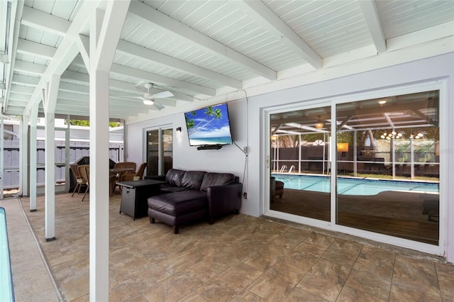 11368 93rd St, Largo, FL 33773 - sunroom / solarium with a ceiling fan, beam ceiling, and an outdoor hangout area