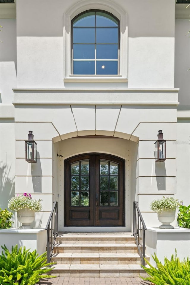 5025 W Homer Ave, Tampa, FL 33629 - entrance to property featuring french doors and stucco siding