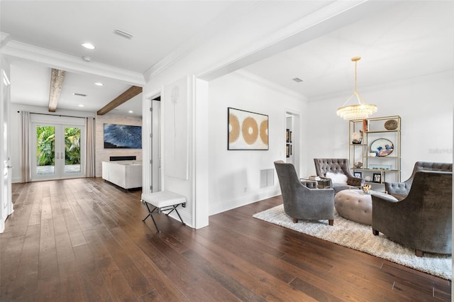5025 W Homer Ave, Tampa, FL 33629 - living room featuring visible vents, baseboards, beam ceiling, and hardwood / wood-style floors