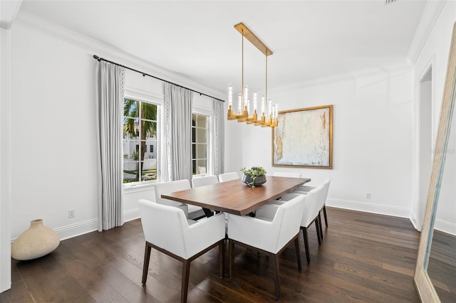 5025 W Homer Ave, Tampa, FL 33629 - dining area featuring ornamental molding, an inviting chandelier, baseboards, and dark wood finished floors