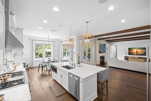 5025 W Homer Ave, Tampa, FL 33629 - kitchen with light countertops, recessed lighting, a sink, and stainless steel appliances