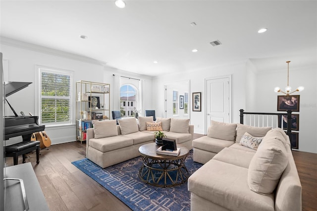 5025 W Homer Ave, Tampa, FL 33629 - living room with visible vents, a notable chandelier, crown molding, recessed lighting, and wood finished floors