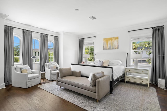 5025 W Homer Ave, Tampa, FL 33629 - bedroom featuring visible vents, crown molding, and wood finished floors