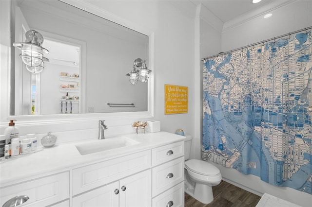 5025 W Homer Ave, Tampa, FL 33629 - bathroom with crown molding, shower / bathtub combination with curtain, vanity, toilet, and wood finished floors