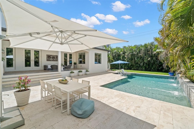 5025 W Homer Ave, Tampa, FL 33629 - pool with french doors, outdoor dining space, and a patio