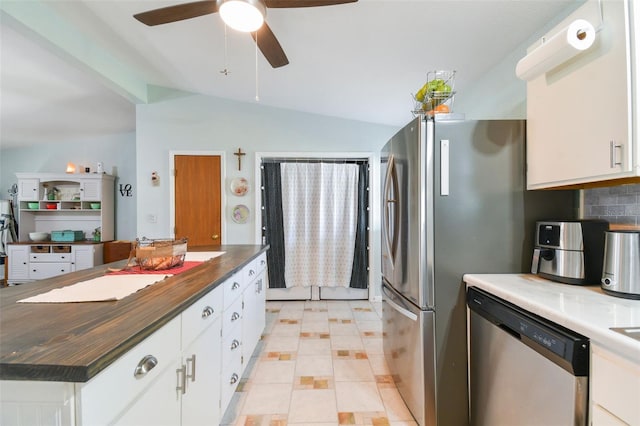 kitchen with backsplash, vaulted ceiling with beams, dishwasher, white cabinets, and ceiling fan