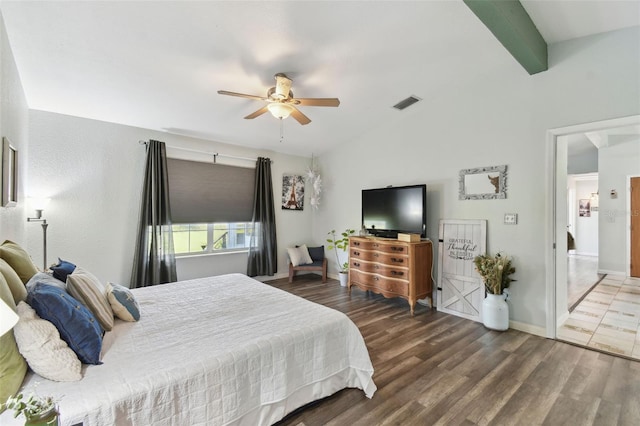 bedroom with lofted ceiling with beams, visible vents, baseboards, ceiling fan, and wood finished floors