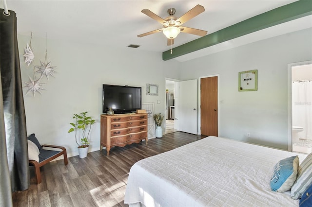 bedroom with lofted ceiling with beams, ensuite bathroom, visible vents, ceiling fan, and wood finished floors