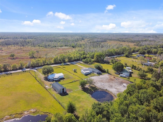 drone / aerial view with a rural view and a forest view