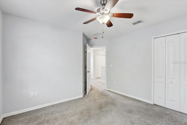 10524 White Peacock Pl, Riverview, FL 33578 - unfurnished bedroom with carpet, a closet, baseboards, and a ceiling fan