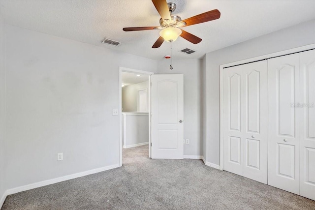 10524 White Peacock Pl, Riverview, FL 33578 - unfurnished bedroom with carpet floors, baseboards, a closet, and ceiling fan