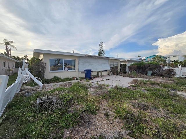 249 144th Ave, Madeira Beach, FL 33708 - back of property with stucco siding