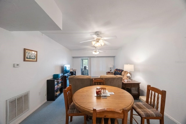 9945 47th Ave N Unit 203, Saint Petersburg, FL 33708 - dining space featuring baseboards, visible vents, carpet floors, and a ceiling fan