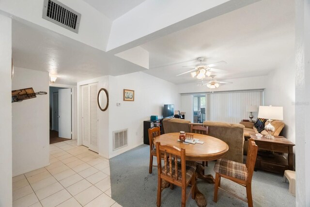 9945 47th Ave N Unit 203, Saint Petersburg, FL 33708 - dining space featuring a ceiling fan, visible vents, and light tile patterned floors