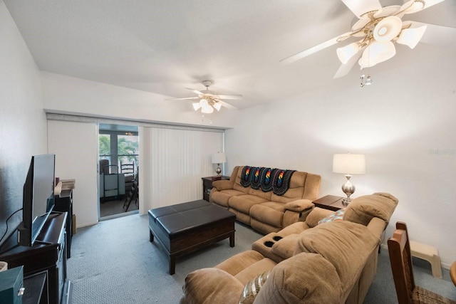 9945 47th Ave N Unit 203, Saint Petersburg, FL 33708 - living room with carpet floors and ceiling fan