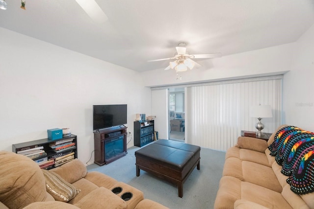 9945 47th Ave N Unit 203, Saint Petersburg, FL 33708 - living area with ceiling fan and carpet