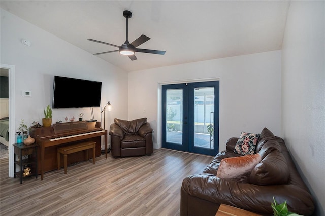 1601 14th St W, Palmetto, FL 34221 - living area with vaulted ceiling, french doors, light wood-style flooring, and a ceiling fan