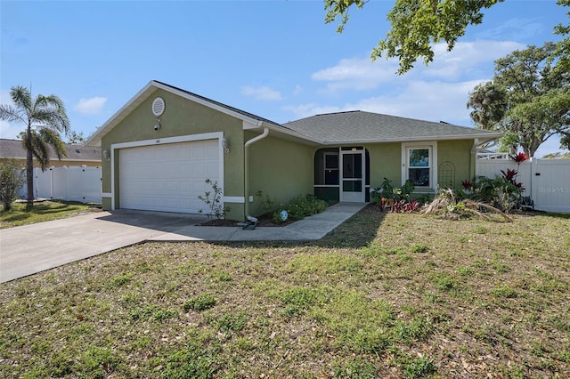 1601 14th St W, Palmetto, FL 34221 - ranch-style house with stucco siding, an attached garage, and concrete driveway