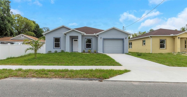 8505 N Brooks St, Tampa, FL 33604 - ranch-style home featuring an attached garage, driveway, and stucco siding