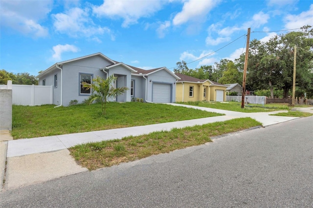 8505 N Brooks St, Tampa, FL 33604 - single story home with a garage, driveway, and stucco siding