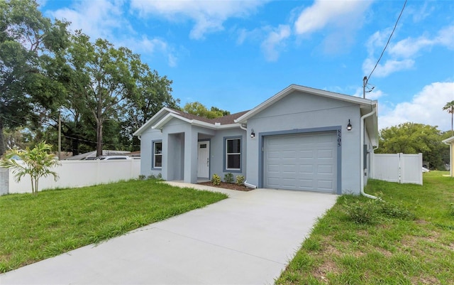 8505 N Brooks St, Tampa, FL 33604 - single story home featuring stucco siding, a garage, and concrete driveway