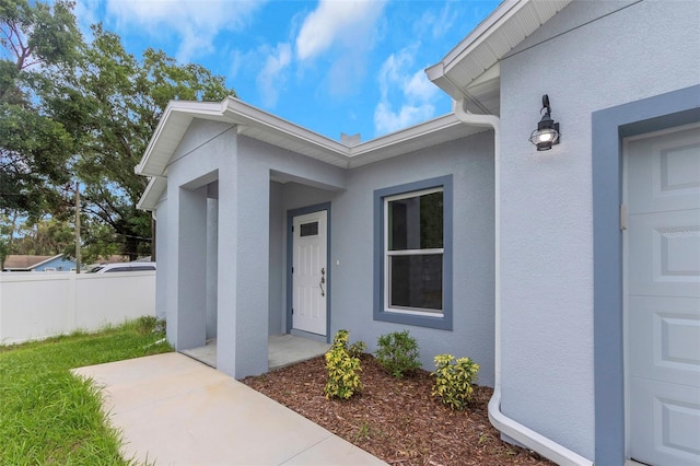 8505 N Brooks St, Tampa, FL 33604 - entrance to property featuring stucco siding