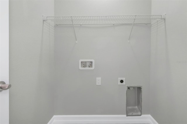 8505 N Brooks St, Tampa, FL 33604 - laundry area featuring washer hookup, electric dryer hookup, and baseboards