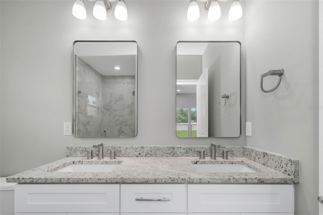 8505 N Brooks St, Tampa, FL 33604 - bathroom featuring double vanity and a marble finish shower