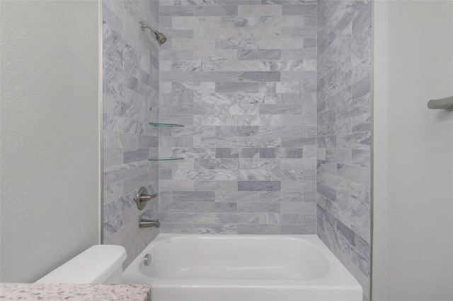 8505 N Brooks St, Tampa, FL 33604 - full bathroom with toilet, tub / shower combination, and a textured wall