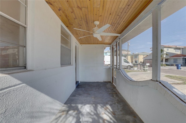 exterior space featuring a residential view and ceiling fan
