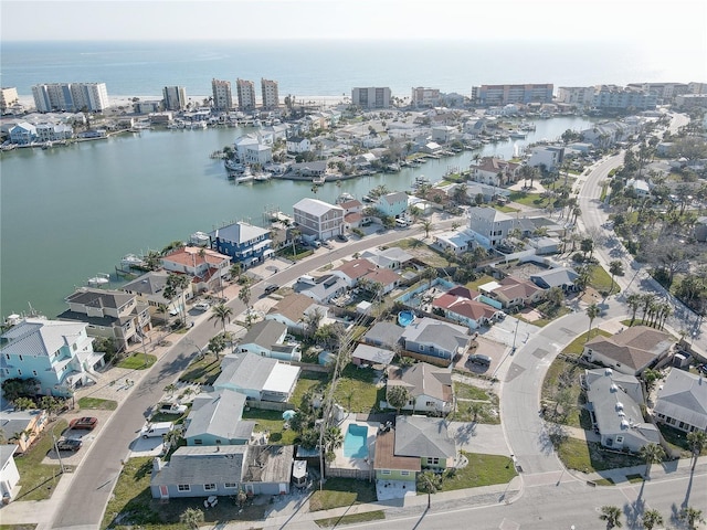 drone / aerial view with a city view, a water view, and a residential view