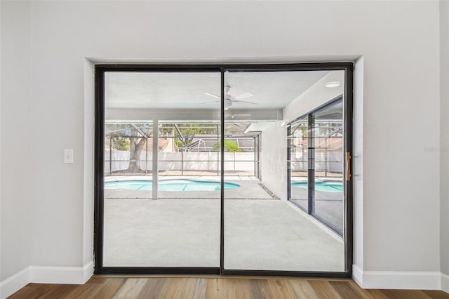 view of swimming pool with ceiling fan