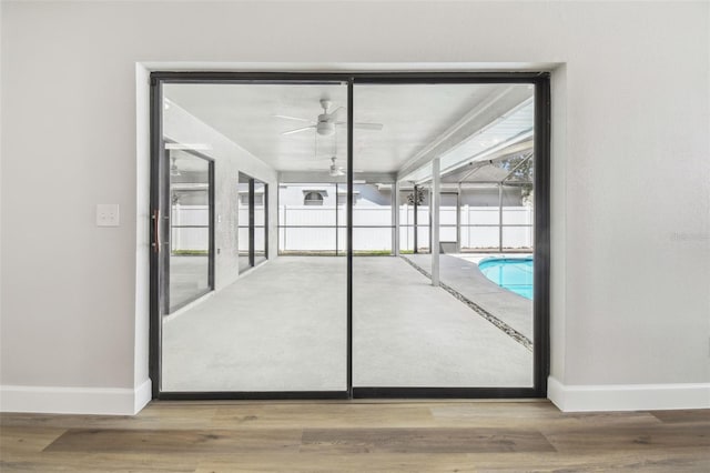 view of swimming pool featuring ceiling fan
