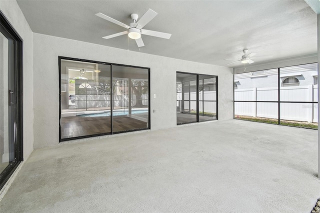 unfurnished sunroom with a healthy amount of sunlight
