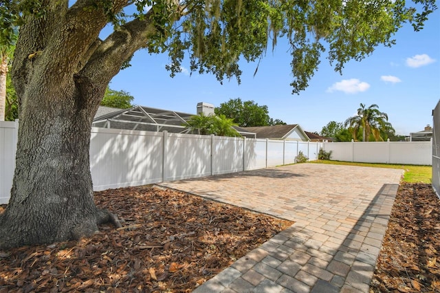 view of yard featuring a fenced backyard and a patio area