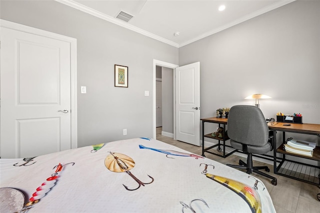 bedroom featuring ornamental molding, visible vents, and wood finished floors