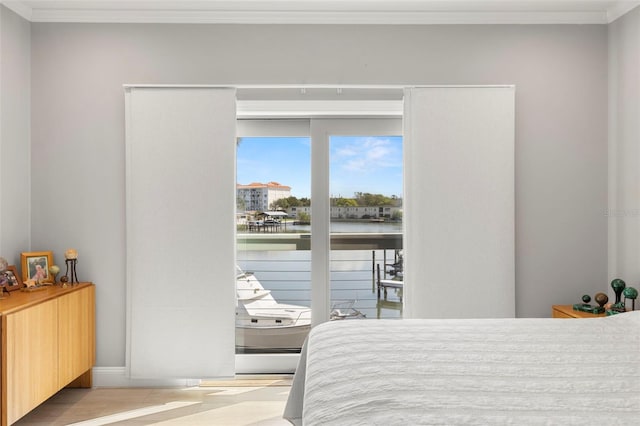 bedroom featuring crown molding
