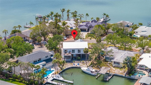 aerial view featuring a residential view and a water view