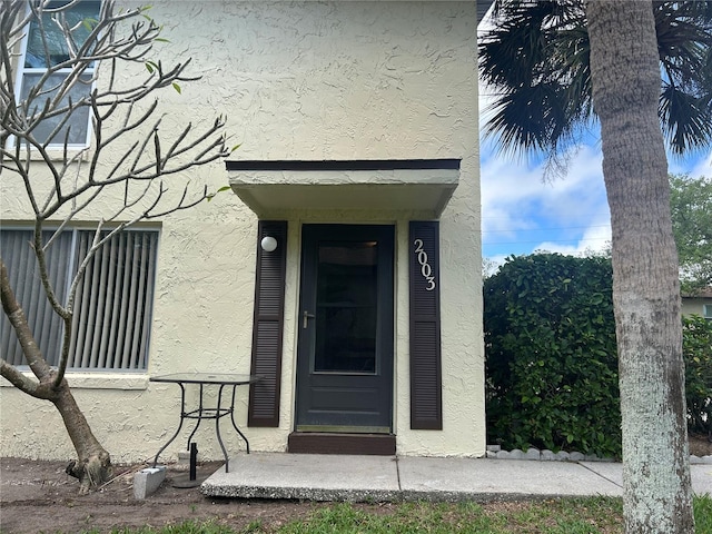 501 E Bay Dr Unit 2003, Largo, FL 33770 - view of exterior entry featuring stucco siding