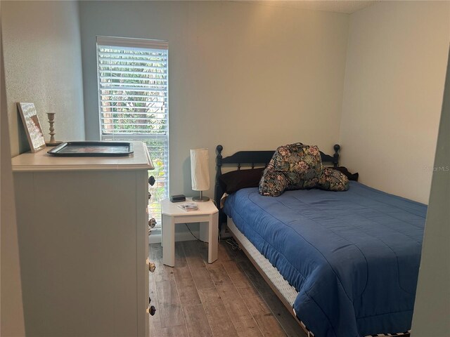 501 E Bay Dr Unit 2003, Largo, FL 33770 - bedroom featuring light wood-type flooring