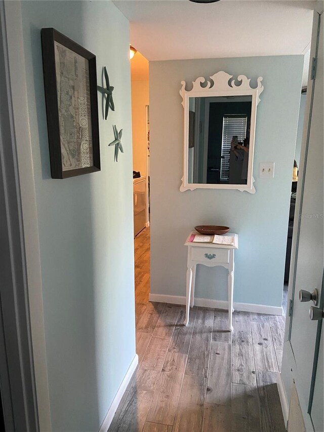 501 E Bay Dr Unit 2003, Largo, FL 33770 - hallway with wood finished floors and baseboards