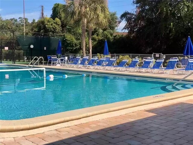 501 E Bay Dr Unit 2003, Largo, FL 33770 - community pool featuring a patio area