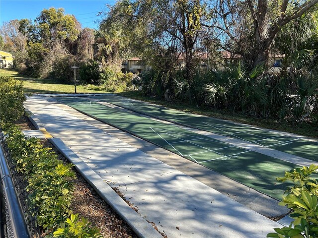 501 E Bay Dr Unit 2003, Largo, FL 33770 - view of home's community with shuffleboard and view of wooded area